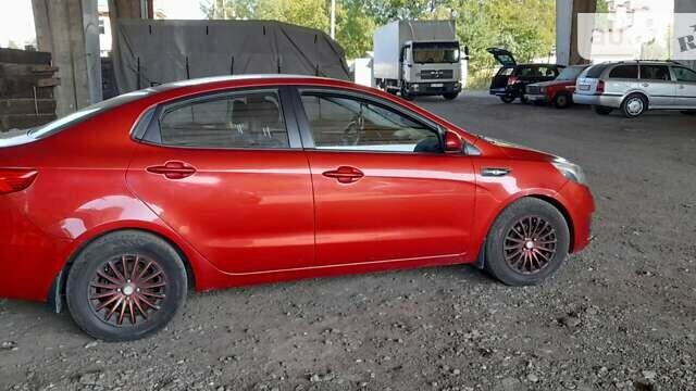 Красный Киа Рио, объемом двигателя 1.4 л и пробегом 319 тыс. км за 5700 $, фото 1 на Automoto.ua