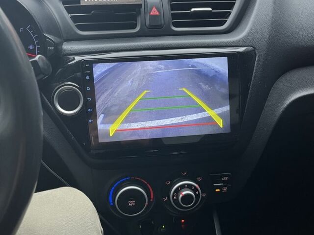 Червоний Кіа Ріо, об'ємом двигуна 1.4 л та пробігом 212 тис. км за 6000 $, фото 10 на Automoto.ua