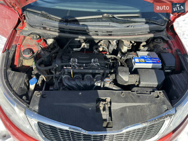 Червоний Кіа Ріо, об'ємом двигуна 1.4 л та пробігом 170 тис. км за 4500 $, фото 23 на Automoto.ua