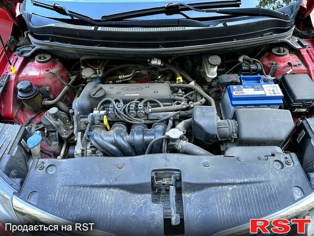 Красный Киа Рио, объемом двигателя 1.4 л и пробегом 190 тыс. км за 6350 $, фото 12 на Automoto.ua