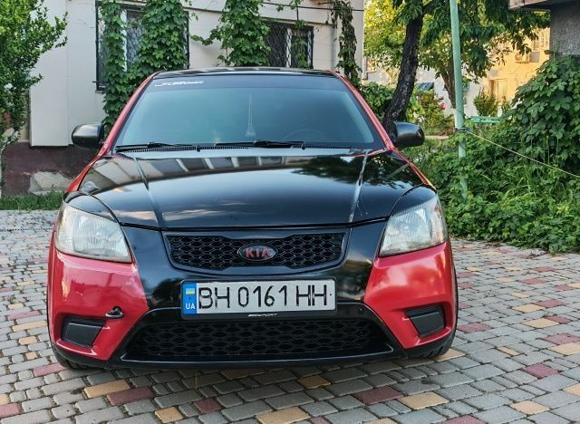 Червоний Кіа Ріо, об'ємом двигуна 1.4 л та пробігом 208 тис. км за 3950 $, фото 1 на Automoto.ua