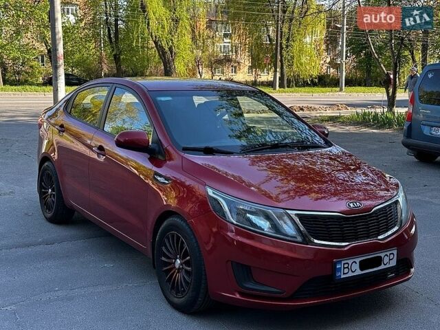 Красный Киа Рио, объемом двигателя 1.4 л и пробегом 190 тыс. км за 6350 $, фото 2 на Automoto.ua