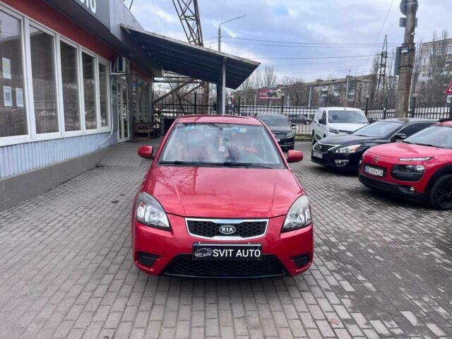Червоний Кіа Ріо, об'ємом двигуна 1.4 л та пробігом 113 тис. км за 5899 $, фото 1 на Automoto.ua