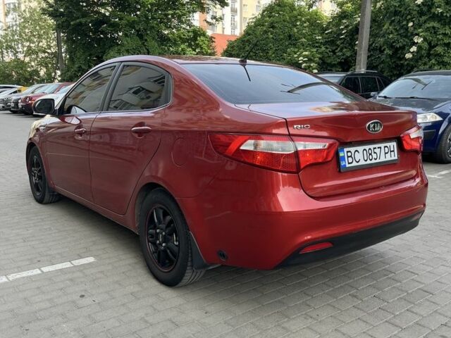 Червоний Кіа Ріо, об'ємом двигуна 1.4 л та пробігом 220 тис. км за 5700 $, фото 4 на Automoto.ua