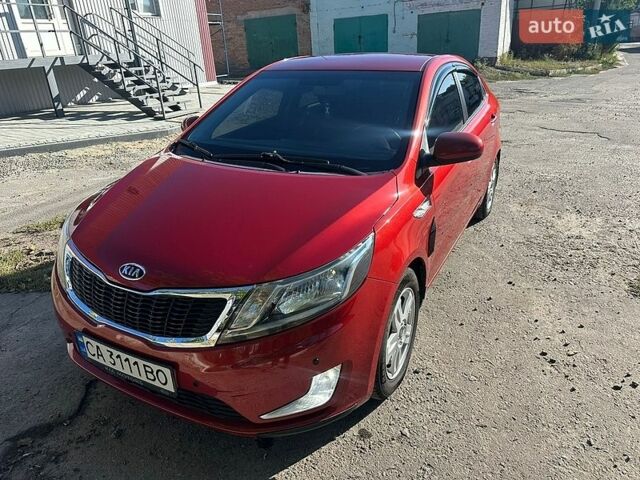 Червоний Кіа Ріо, об'ємом двигуна 1.6 л та пробігом 160 тис. км за 7800 $, фото 7 на Automoto.ua