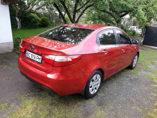 Красный Киа Рио, объемом двигателя 1.4 л и пробегом 134 тыс. км за 6400 $, фото 1 на Automoto.ua