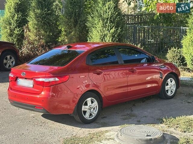 Червоний Кіа Ріо, об'ємом двигуна 1.6 л та пробігом 160 тис. км за 7800 $, фото 12 на Automoto.ua