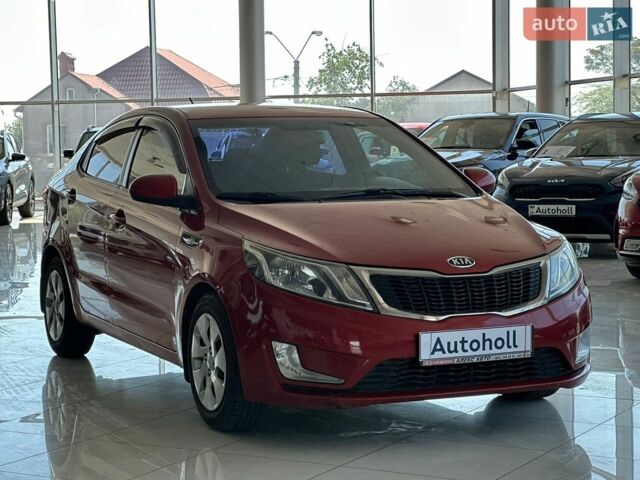Красный Киа Рио, объемом двигателя 1.4 л и пробегом 253 тыс. км за 7000 $, фото 2 на Automoto.ua