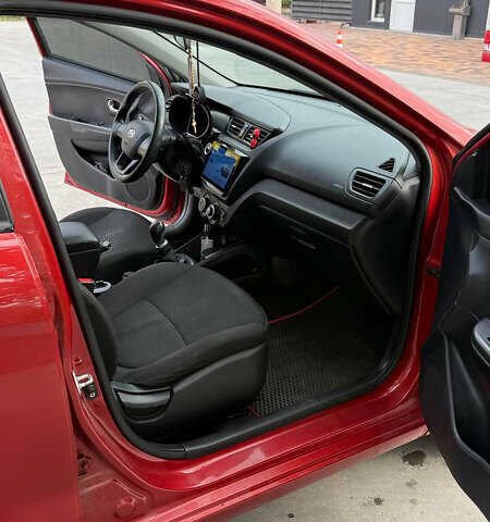 Червоний Кіа Ріо, об'ємом двигуна 1.4 л та пробігом 158 тис. км за 6500 $, фото 6 на Automoto.ua