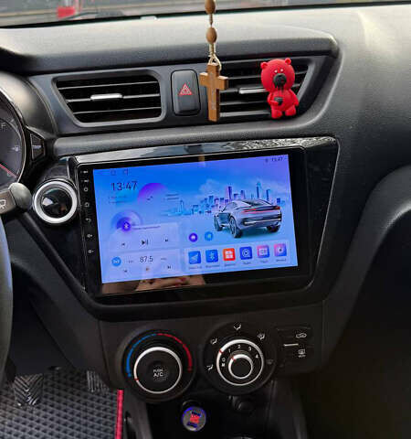 Червоний Кіа Ріо, об'ємом двигуна 1.4 л та пробігом 158 тис. км за 6500 $, фото 5 на Automoto.ua