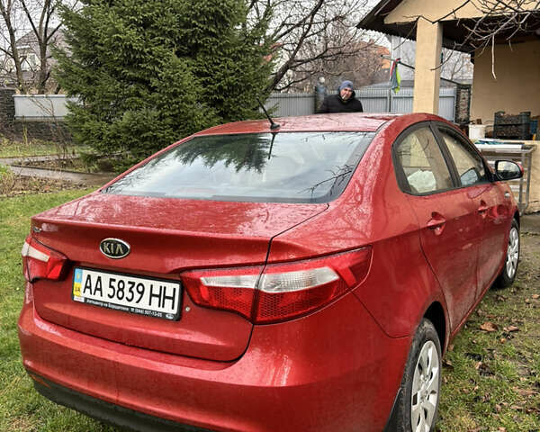 Червоний Кіа Ріо, об'ємом двигуна 1.4 л та пробігом 165 тис. км за 4500 $, фото 1 на Automoto.ua
