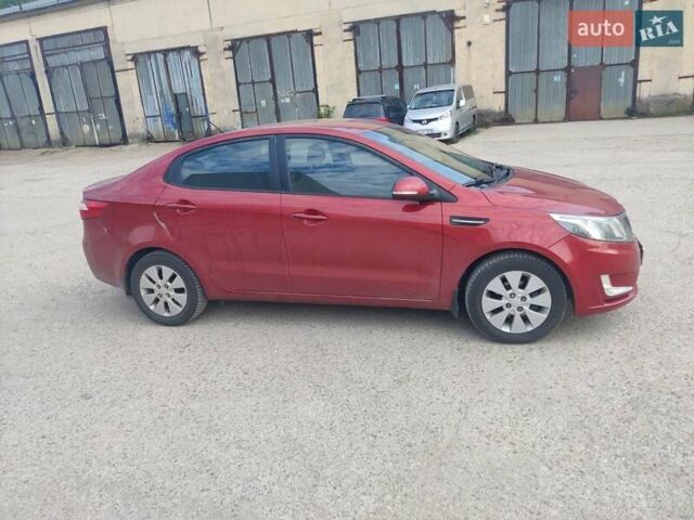 Красный Киа Рио, объемом двигателя 1.6 л и пробегом 94 тыс. км за 8200 $, фото 1 на Automoto.ua