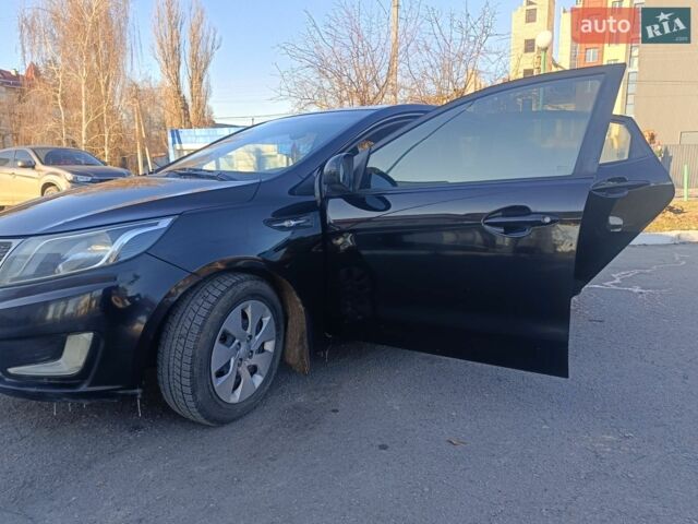 Красный Киа Рио, объемом двигателя 1.4 л и пробегом 232 тыс. км за 5300 $, фото 2 на Automoto.ua