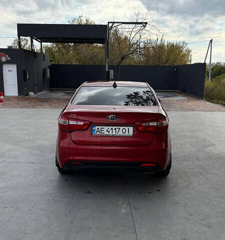 Червоний Кіа Ріо, об'ємом двигуна 1.4 л та пробігом 158 тис. км за 6500 $, фото 3 на Automoto.ua