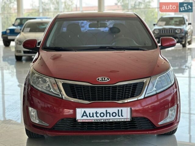 Красный Киа Рио, объемом двигателя 1.4 л и пробегом 253 тыс. км за 7000 $, фото 1 на Automoto.ua