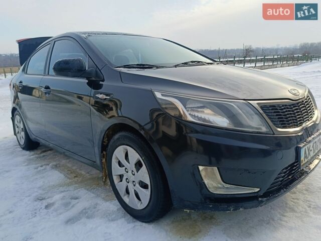 Красный Киа Рио, объемом двигателя 1.4 л и пробегом 232 тыс. км за 5300 $, фото 1 на Automoto.ua