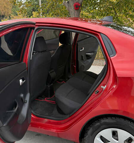 Червоний Кіа Ріо, об'ємом двигуна 1.4 л та пробігом 158 тис. км за 6500 $, фото 7 на Automoto.ua