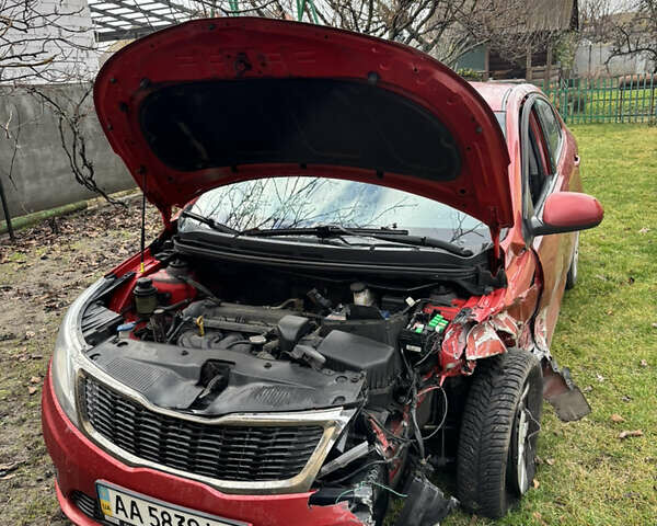 Червоний Кіа Ріо, об'ємом двигуна 1.4 л та пробігом 165 тис. км за 4500 $, фото 2 на Automoto.ua