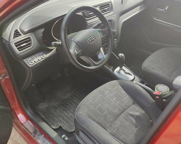 Красный Киа Рио, объемом двигателя 1.6 л и пробегом 94 тыс. км за 8200 $, фото 2 на Automoto.ua
