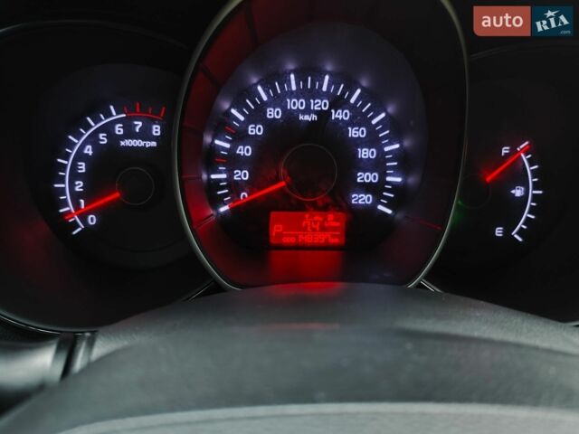 Червоний Кіа Ріо, об'ємом двигуна 1.4 л та пробігом 148 тис. км за 7950 $, фото 12 на Automoto.ua