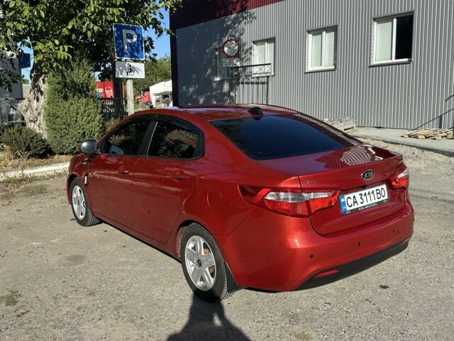 Красный Киа Рио, объемом двигателя 1.6 л и пробегом 169 тыс. км за 7799 $, фото 4 на Automoto.ua