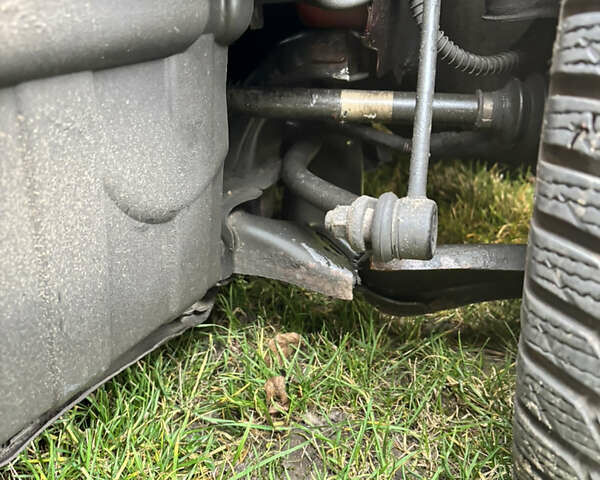 Червоний Кіа Ріо, об'ємом двигуна 1.4 л та пробігом 165 тис. км за 4500 $, фото 3 на Automoto.ua