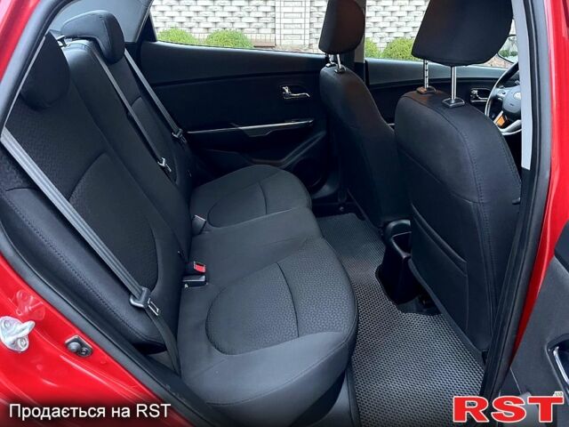 Червоний Кіа Ріо, об'ємом двигуна 1.6 л та пробігом 113 тис. км за 9500 $, фото 11 на Automoto.ua