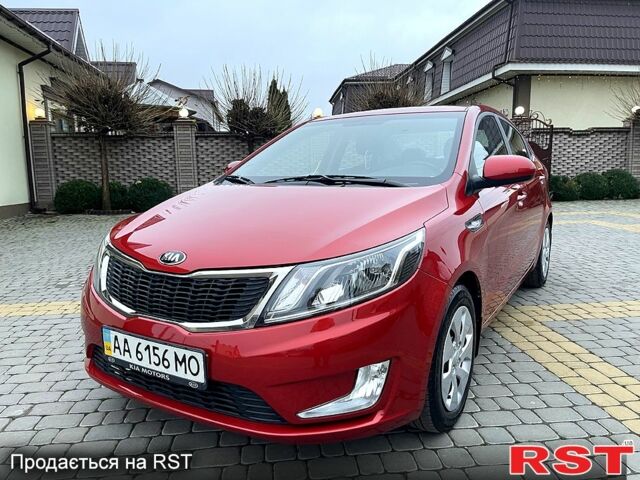 Червоний Кіа Ріо, об'ємом двигуна 1.6 л та пробігом 113 тис. км за 9500 $, фото 3 на Automoto.ua