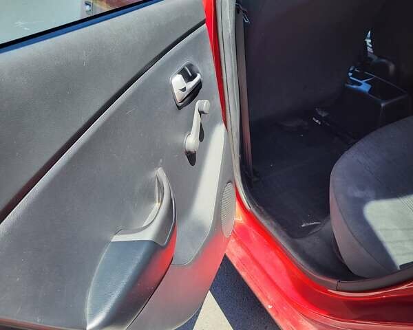 Красный Киа Рио, объемом двигателя 1.4 л и пробегом 126 тыс. км за 7900 $, фото 14 на Automoto.ua