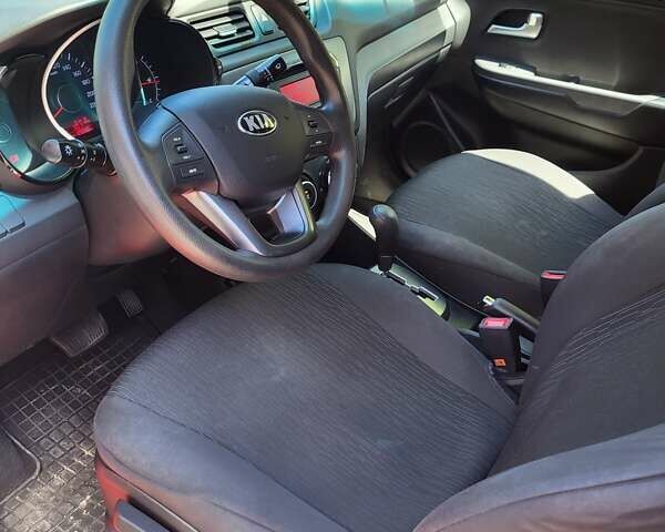 Красный Киа Рио, объемом двигателя 1.4 л и пробегом 126 тыс. км за 7900 $, фото 13 на Automoto.ua