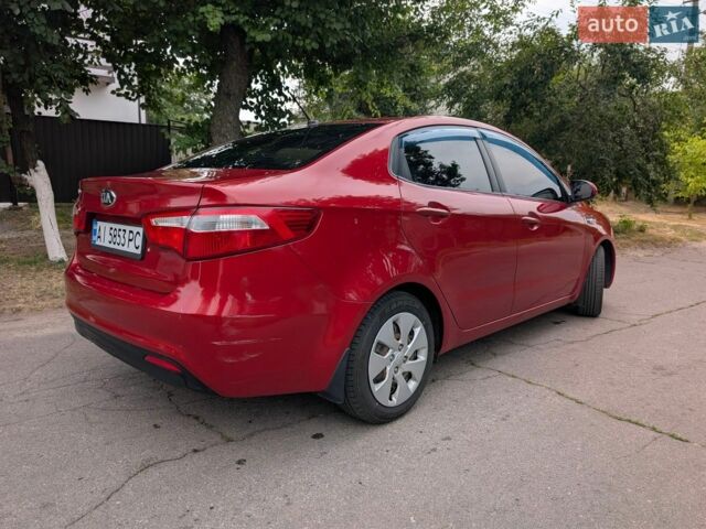 Красный Киа Рио, объемом двигателя 1.4 л и пробегом 181 тыс. км за 6800 $, фото 2 на Automoto.ua