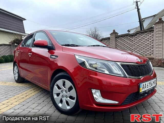 Червоний Кіа Ріо, об'ємом двигуна 1.6 л та пробігом 1130 тис. км за 9500 $, фото 4 на Automoto.ua