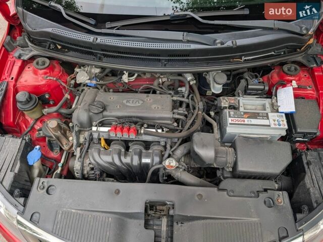 Красный Киа Рио, объемом двигателя 1.4 л и пробегом 181 тыс. км за 6800 $, фото 13 на Automoto.ua