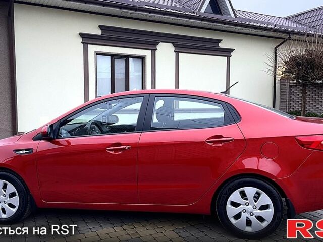 Червоний Кіа Ріо, об'ємом двигуна 1.6 л та пробігом 1130 тис. км за 9500 $, фото 6 на Automoto.ua