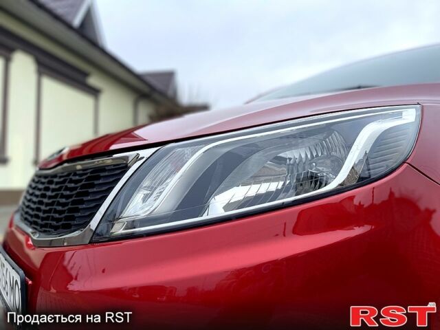 Червоний Кіа Ріо, об'ємом двигуна 1.6 л та пробігом 113 тис. км за 9500 $, фото 2 на Automoto.ua