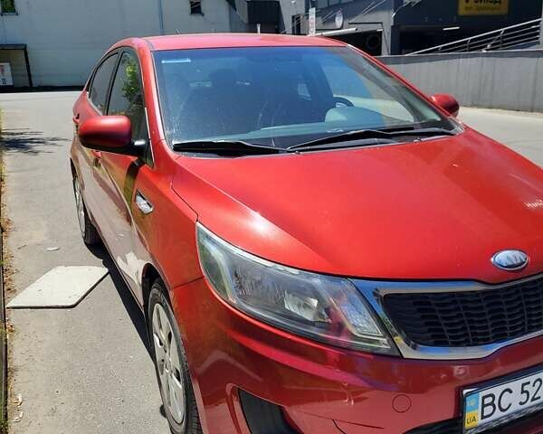 Красный Киа Рио, объемом двигателя 1.4 л и пробегом 126 тыс. км за 7900 $, фото 1 на Automoto.ua