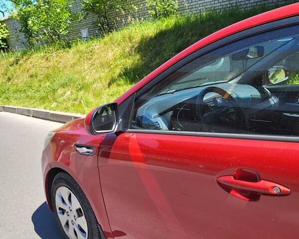 Красный Киа Рио, объемом двигателя 1.4 л и пробегом 126 тыс. км за 7900 $, фото 7 на Automoto.ua