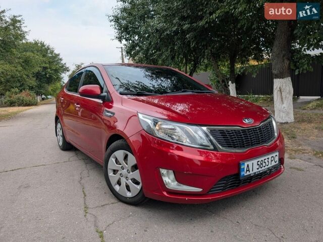 Красный Киа Рио, объемом двигателя 1.4 л и пробегом 181 тыс. км за 6800 $, фото 1 на Automoto.ua