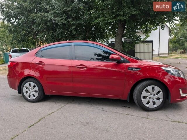 Красный Киа Рио, объемом двигателя 1.4 л и пробегом 181 тыс. км за 6800 $, фото 3 на Automoto.ua
