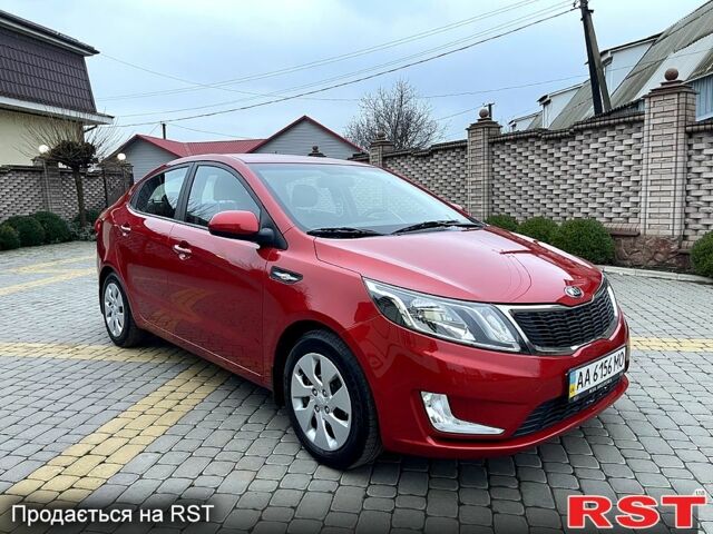 Червоний Кіа Ріо, об'ємом двигуна 1.6 л та пробігом 1130 тис. км за 9500 $, фото 5 на Automoto.ua