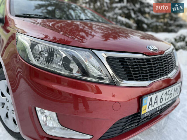 Червоний Кіа Ріо, об'ємом двигуна 1.6 л та пробігом 113 тис. км за 9500 $, фото 3 на Automoto.ua