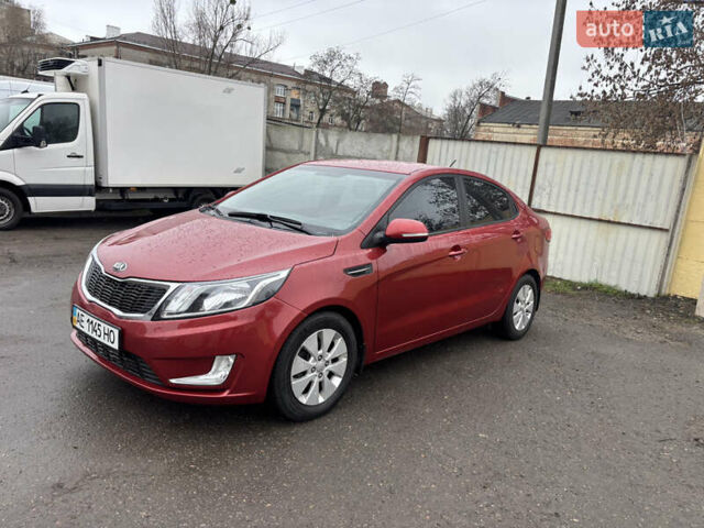 Червоний Кіа Ріо, об'ємом двигуна 1.6 л та пробігом 35 тис. км за 9998 $, фото 1 на Automoto.ua