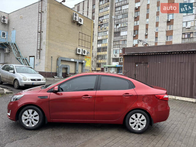 Червоний Кіа Ріо, об'ємом двигуна 1.6 л та пробігом 35 тис. км за 9998 $, фото 10 на Automoto.ua