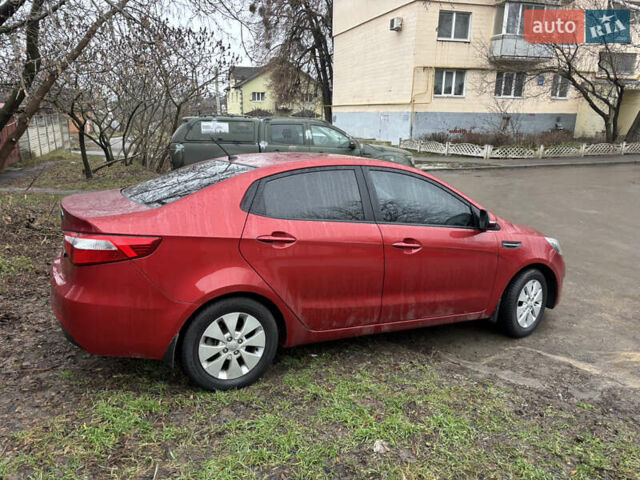 Червоний Кіа Ріо, об'ємом двигуна 1.6 л та пробігом 35 тис. км за 9998 $, фото 26 на Automoto.ua