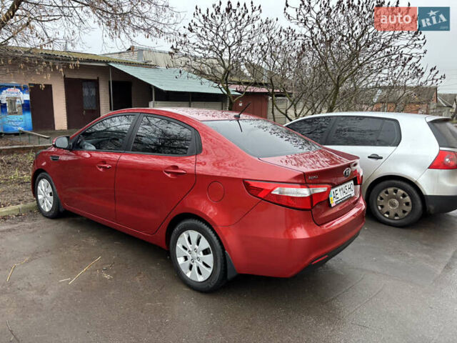Червоний Кіа Ріо, об'ємом двигуна 1.6 л та пробігом 35 тис. км за 9998 $, фото 4 на Automoto.ua