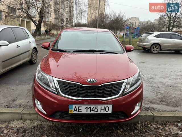 Червоний Кіа Ріо, об'ємом двигуна 1.6 л та пробігом 35 тис. км за 9998 $, фото 3 на Automoto.ua