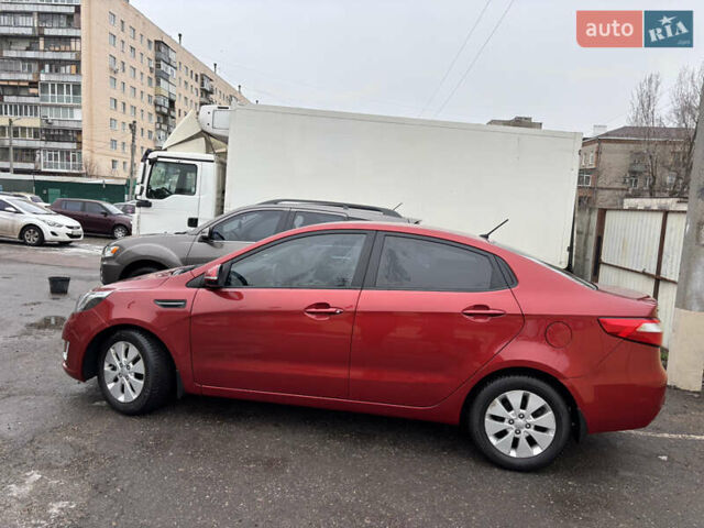 Червоний Кіа Ріо, об'ємом двигуна 1.6 л та пробігом 35 тис. км за 9998 $, фото 25 на Automoto.ua