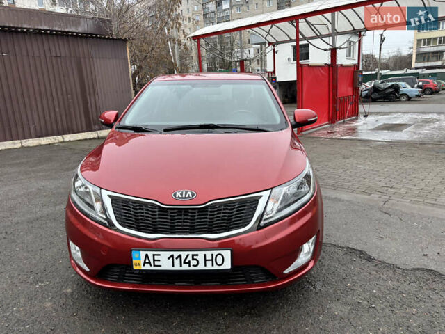 Червоний Кіа Ріо, об'ємом двигуна 1.6 л та пробігом 35 тис. км за 9998 $, фото 12 на Automoto.ua