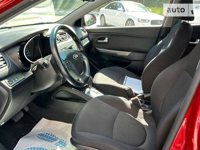 Червоний Кіа Ріо, об'ємом двигуна 1.4 л та пробігом 35 тис. км за 12800 $, фото 7 на Automoto.ua