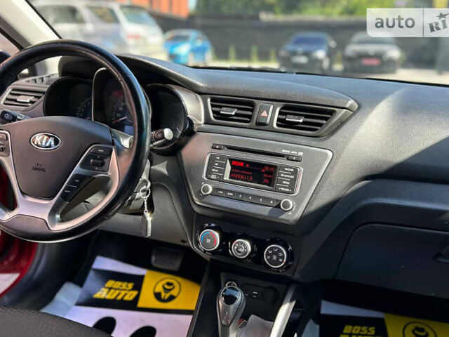 Червоний Кіа Ріо, об'ємом двигуна 1.4 л та пробігом 35 тис. км за 12800 $, фото 13 на Automoto.ua